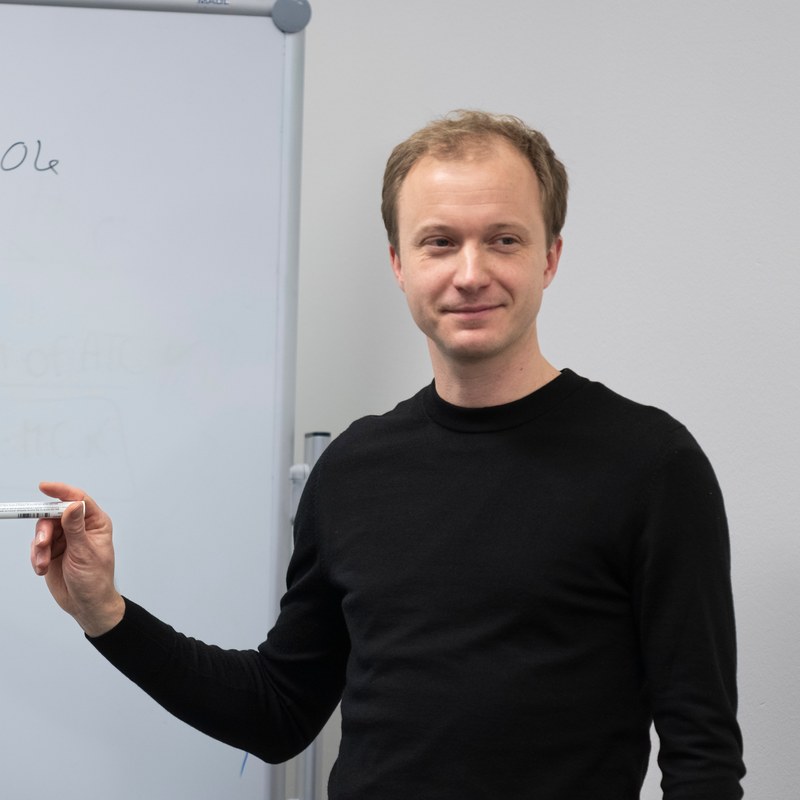 Lion Hirth at the whiteboard